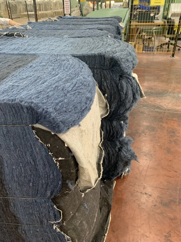 Bales of recycled denim fibre